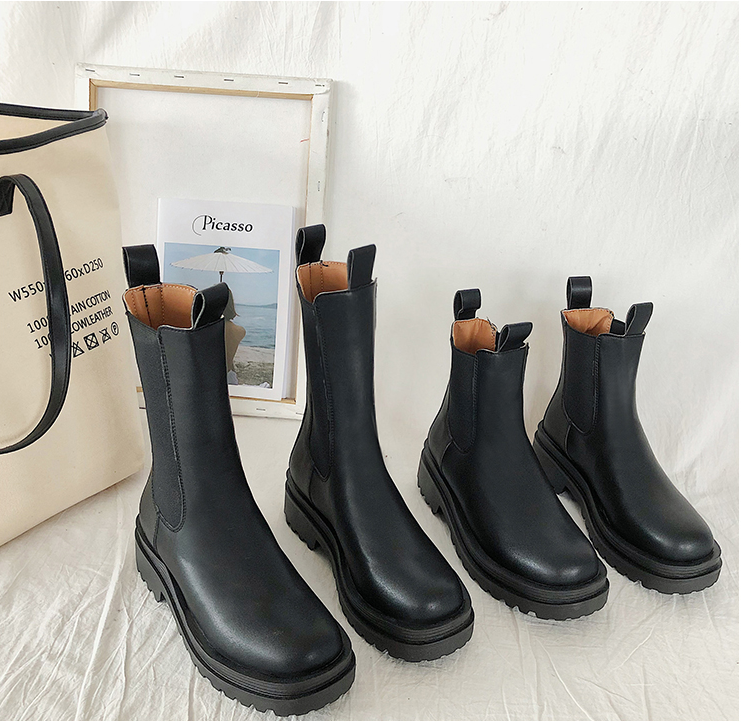 Black lug sole Chelsea boots in ankle and tall shaft heights