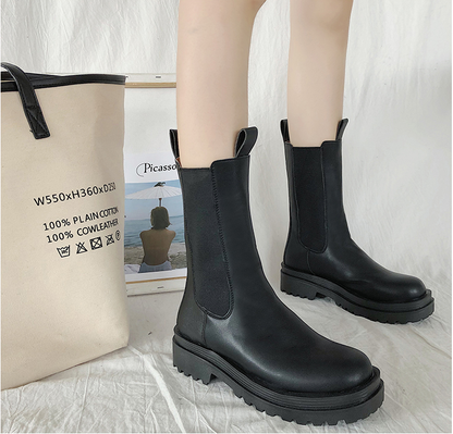 Black lug sole Chelsea boots in two shaft heights