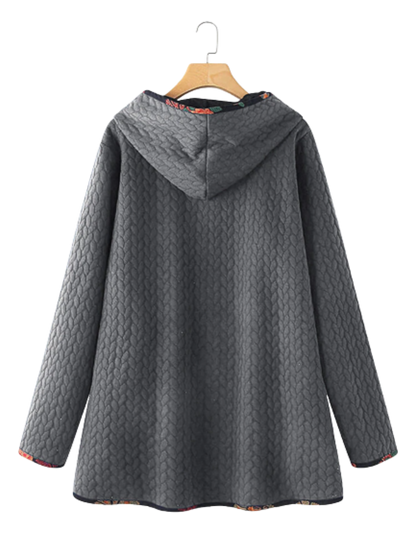 Women’s Hooded Quilted Coat – Longline Textured Layer for Relaxed Winter Styling