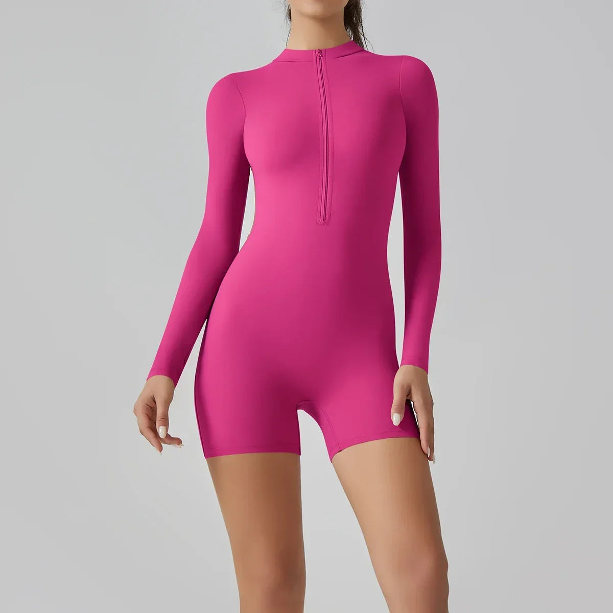 Women’s Long-Sleeve Zip-Up Workout Romper – Fitted Activewear Style for Training and Everyday Wear