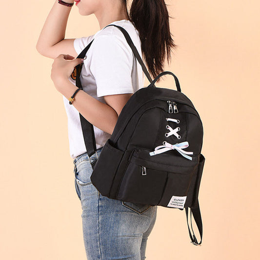 Women’s Bow-Detail Nylon Backpack – Compact Multi-Pocket School Bag with Adjustable Shoulder Straps