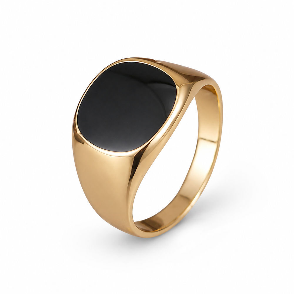 black gold signet ring on white background