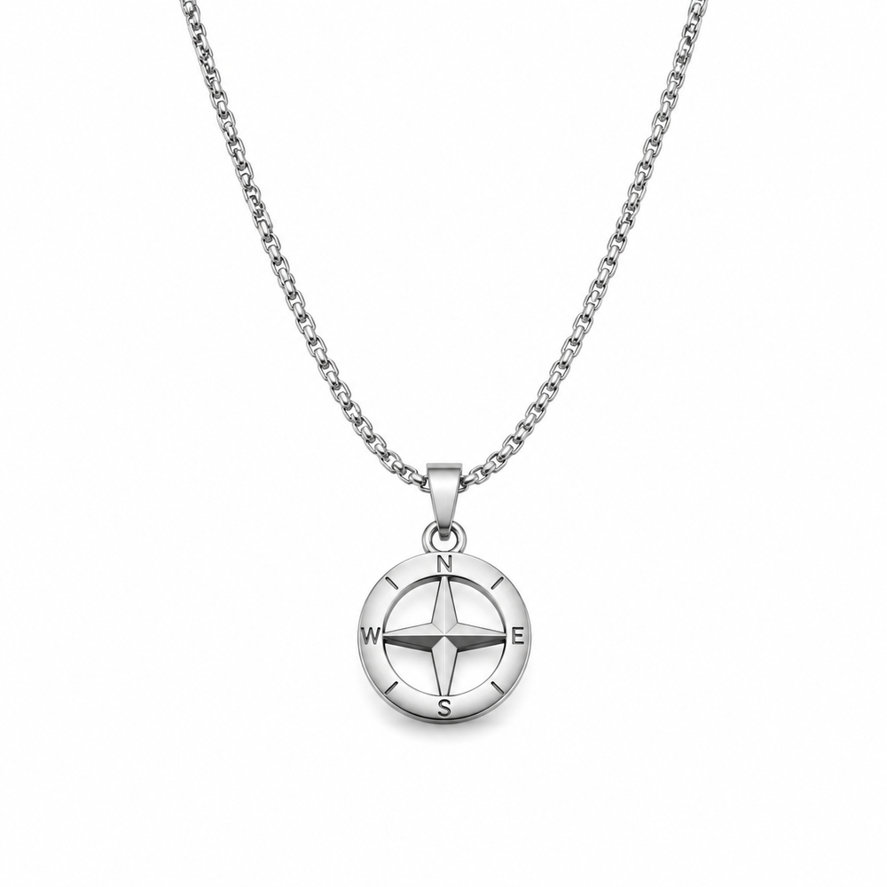 Silver compass cross pendant necklace on white