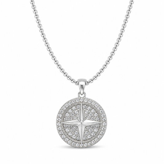 Silver iced compass pendant necklace on white