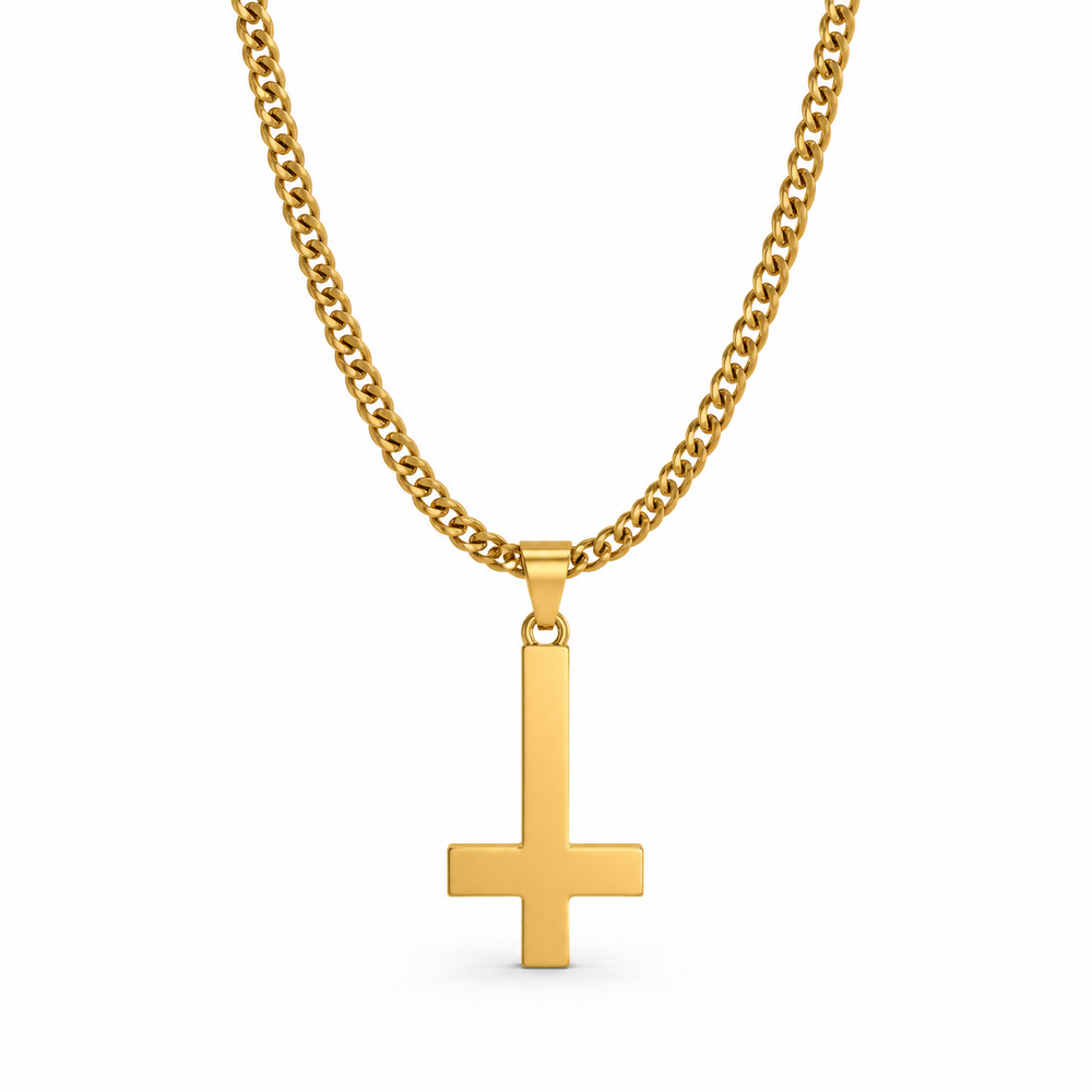 Gold inverted cross necklace on white