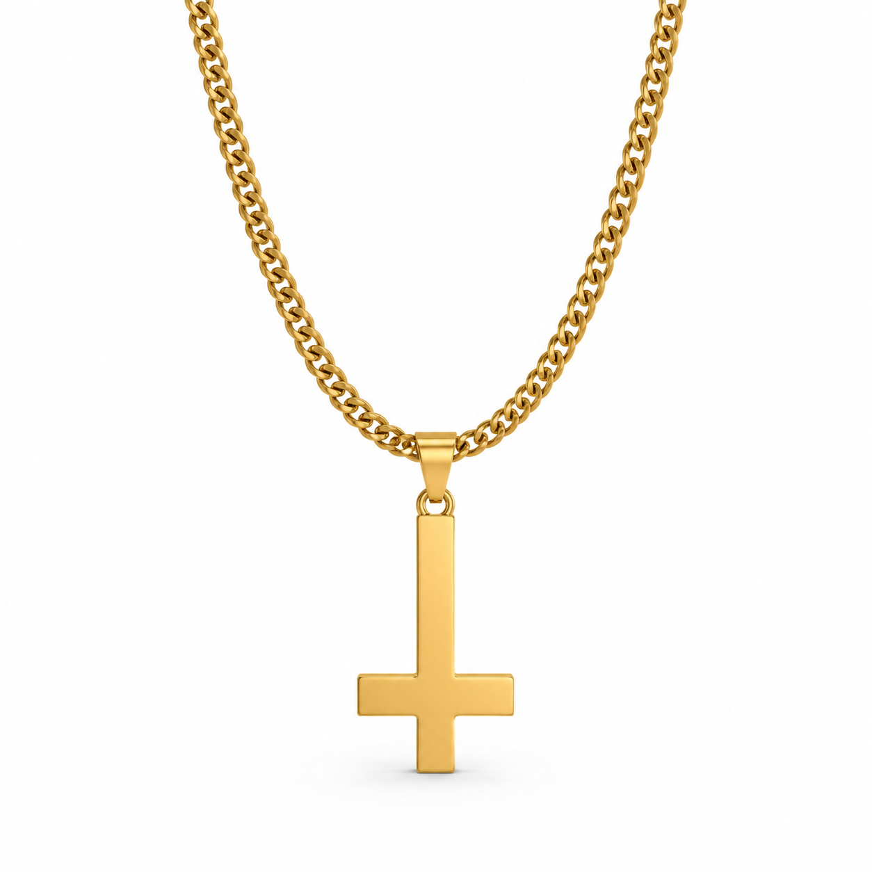 Gold inverted cross necklace on white