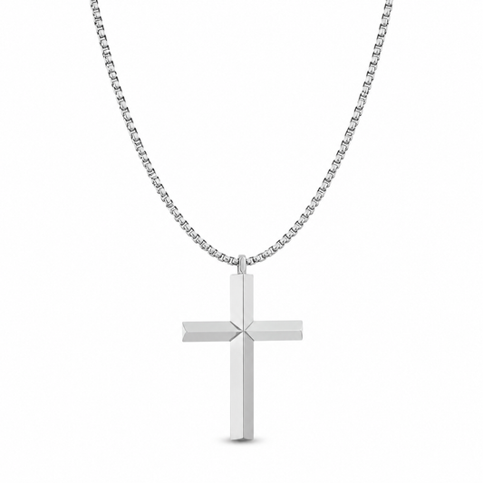 Large silver beveled cross necklace on white