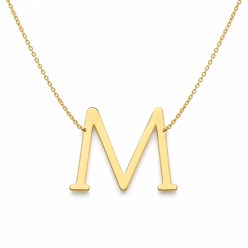 large script initial necklace on white background