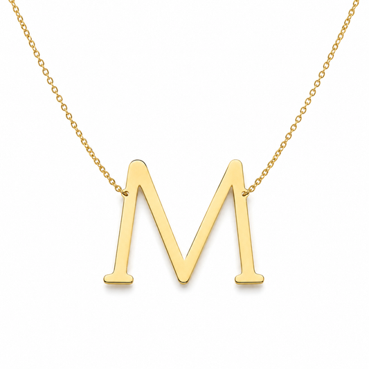 large script initial necklace on white background