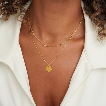 Women’s Layered Pendant Necklace – Gold-Plated Double Chain with Beaded Detail and Round Disc Charm for Everyday Wear