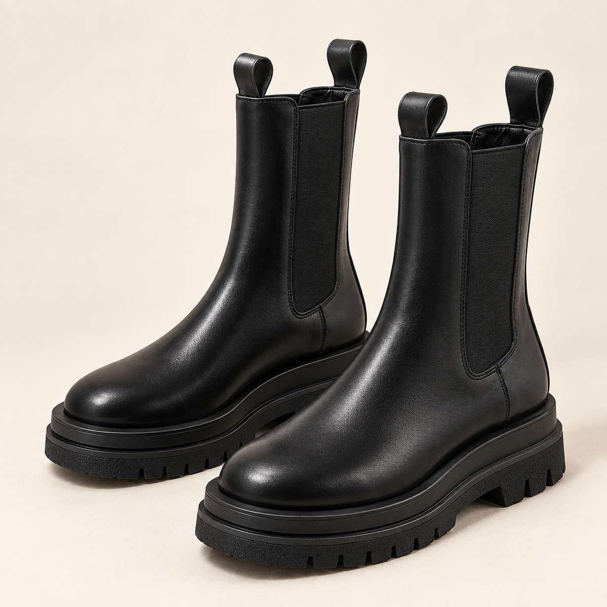 Women's black mid-calf Chelsea boots - studio hero