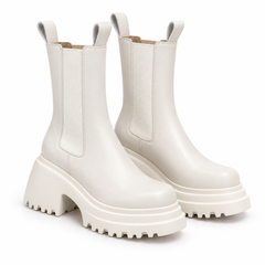 Women's cream chunky lug sole Chelsea boots on a white background