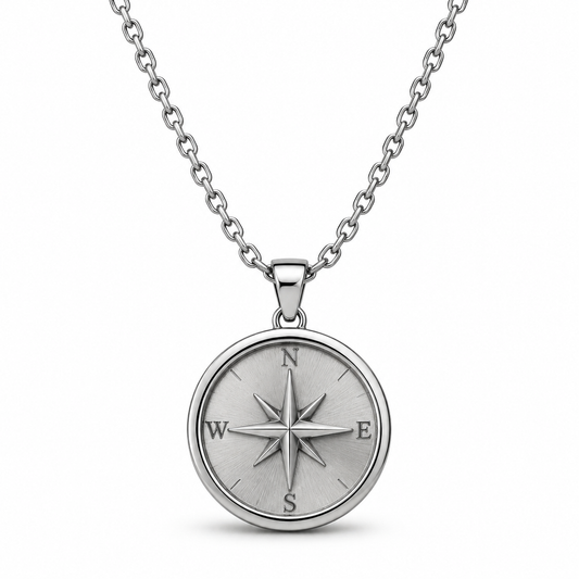 Silver round compass pendant necklace on white