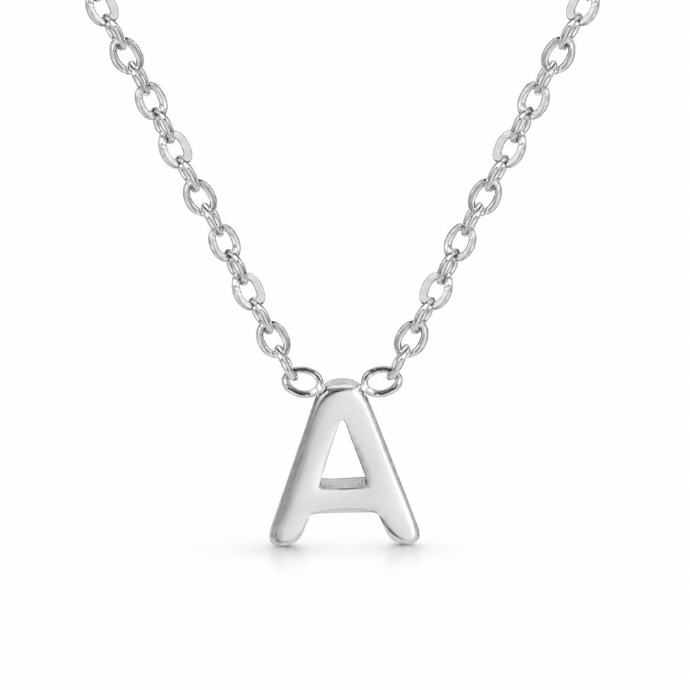steel initial necklace on white background