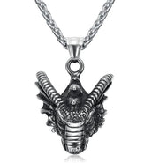 Antiqued basilisk head pendant necklace on white