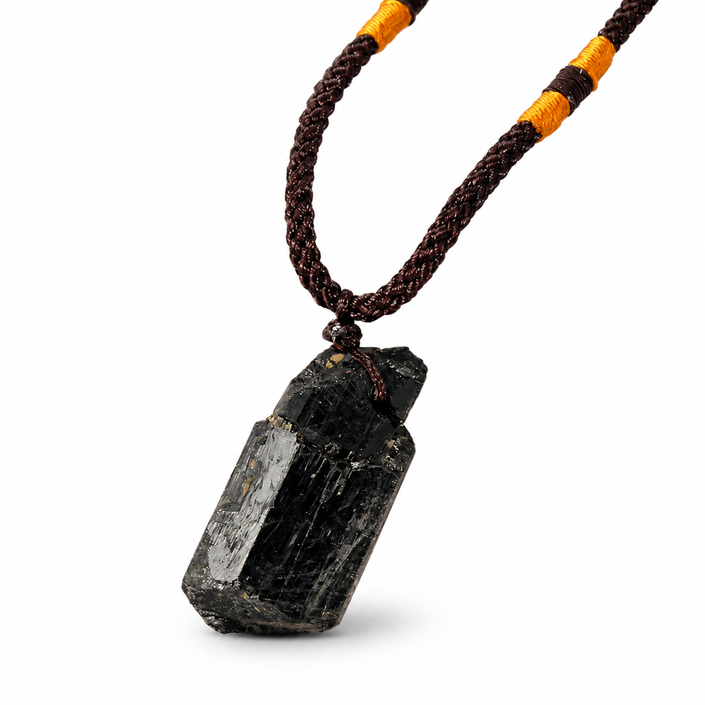 Raw Black Stone Pendant Necklace on pure white background