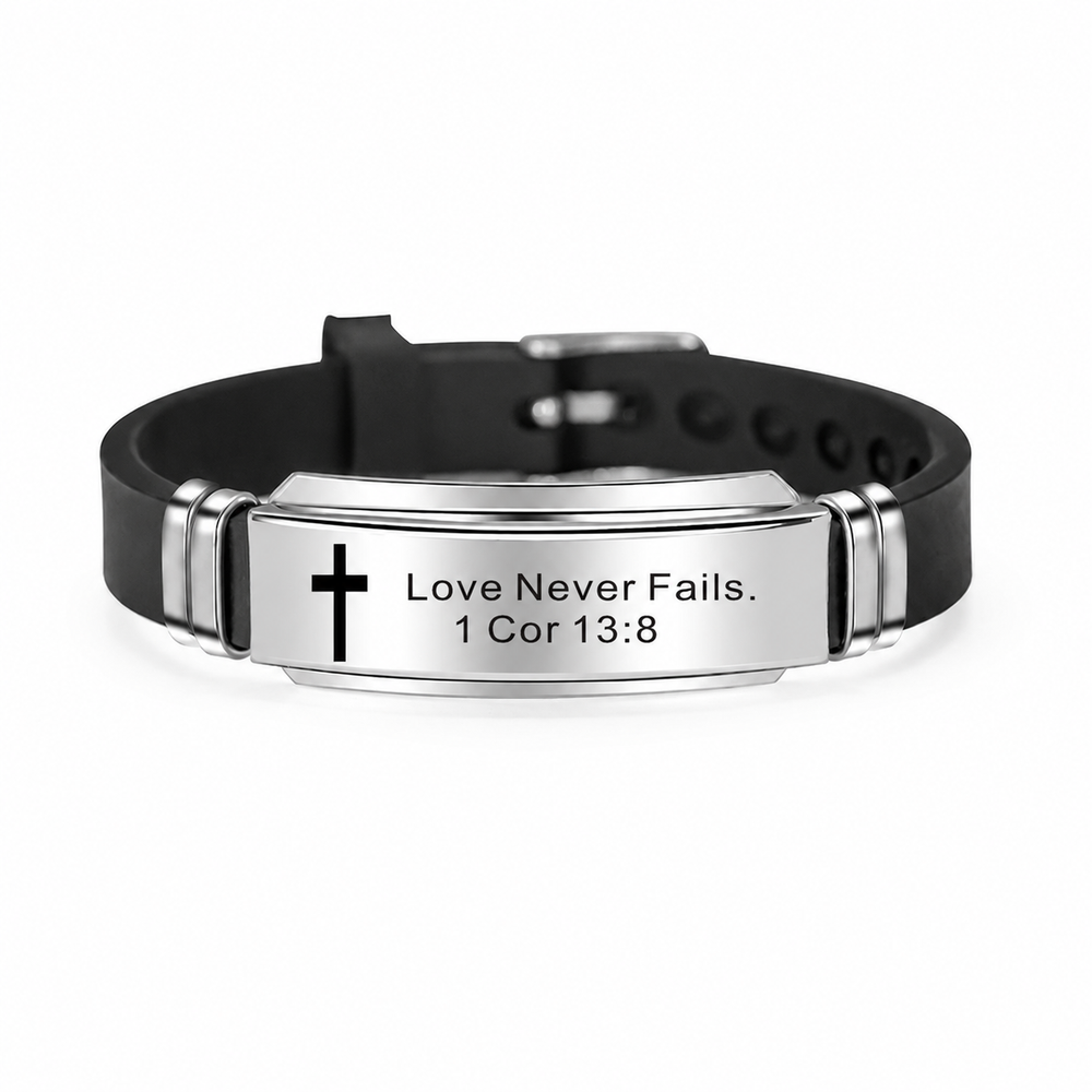 Love Never Fails Scripture ID Bracelet on pure white background