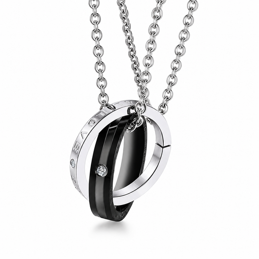 Black Concentric Ring Pendant Necklace on a pure white background