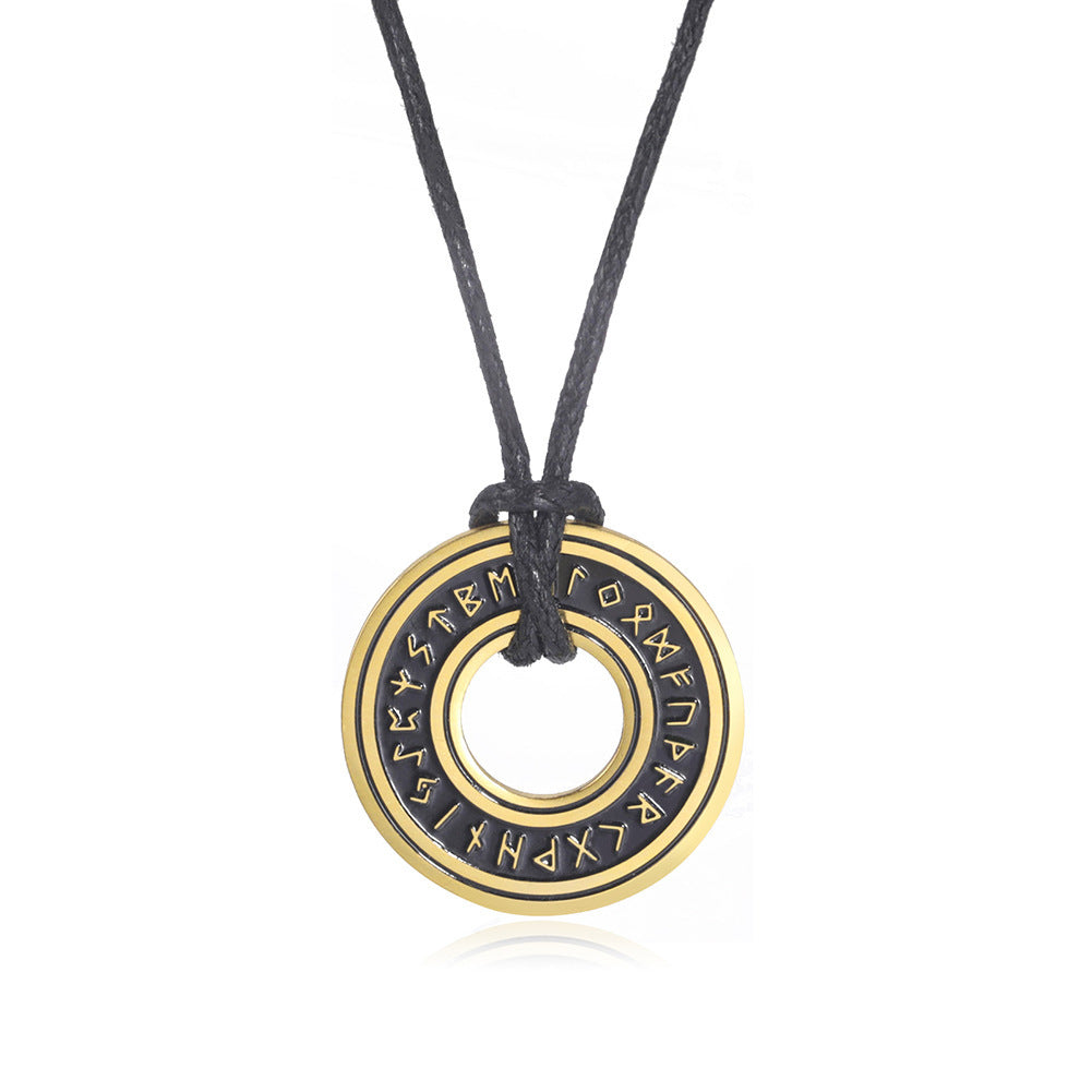 Gold-tone Elder Futhark rune disc necklace on white