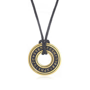 Gold-tone Elder Futhark rune disc necklace on white