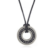 Silver-tone Elder Futhark rune disc necklace on white
