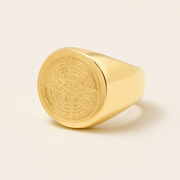 Gold compass signet ring