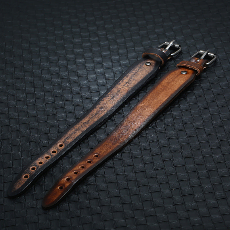 Wide leather bracelet buckle and band detail