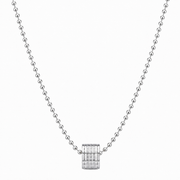 Silver-tone barrel pendant necklace on white