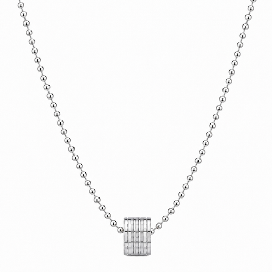 Silver-tone barrel pendant necklace on white