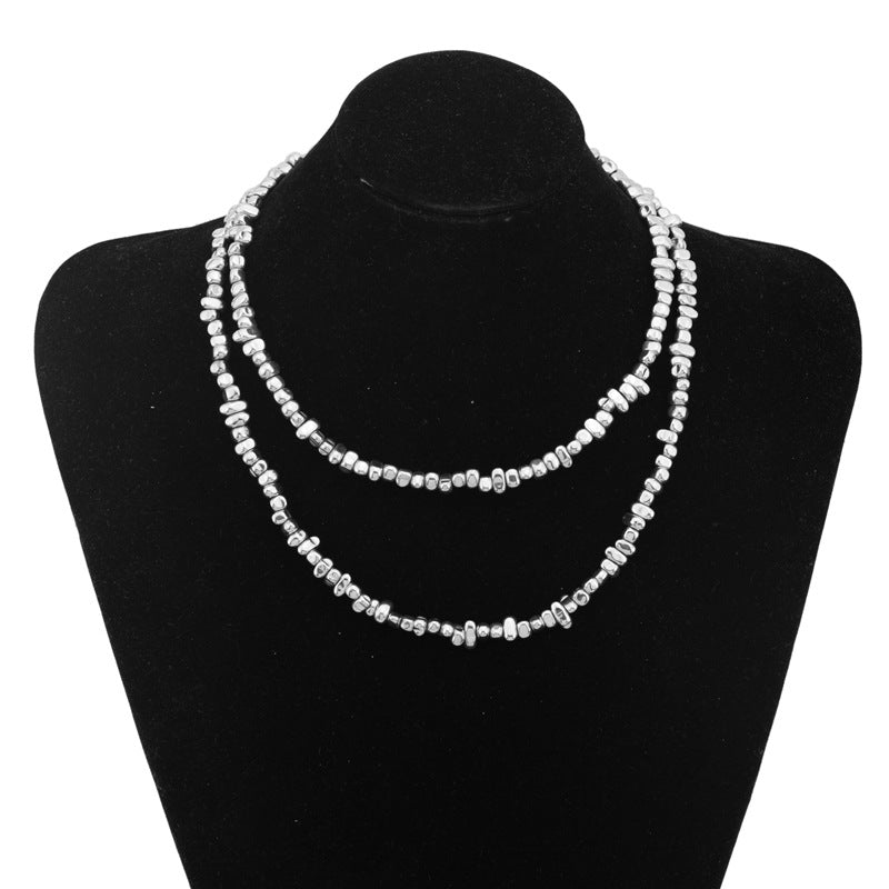 Silver twisted bead chain necklace