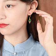 Vintage gold-tone copper earrings alternate view